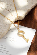 Collier clé doré strass acier inoxydable trèfle ajouré chic