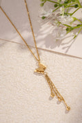 Collier papillon doré en acier inoxydable avec pampilles